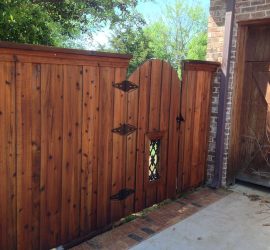 Wood fence cleaning and staining